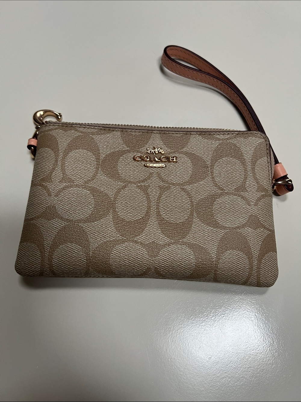 Coach Tan Signature Canvas Wristlet with Pink Accent